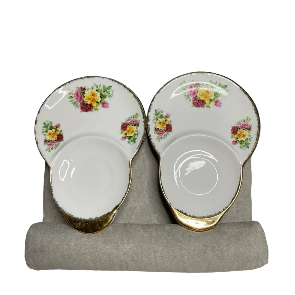 Sitra two (2) Fine ceramic Floral/ gold trim Ceramic Tea saucer/trinket dishes